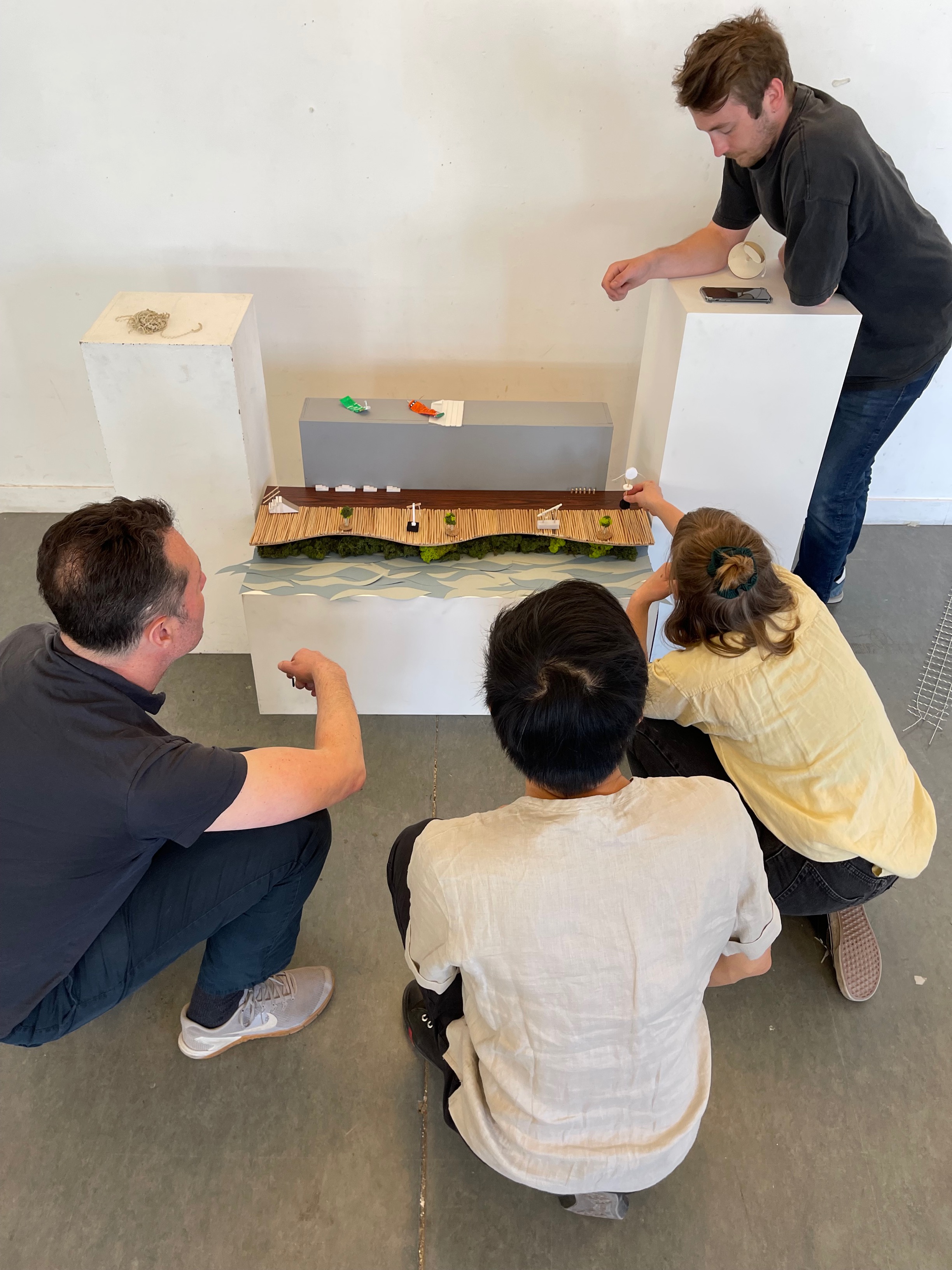 Group of 4 students work together on an inclusive and diversity inspired design
