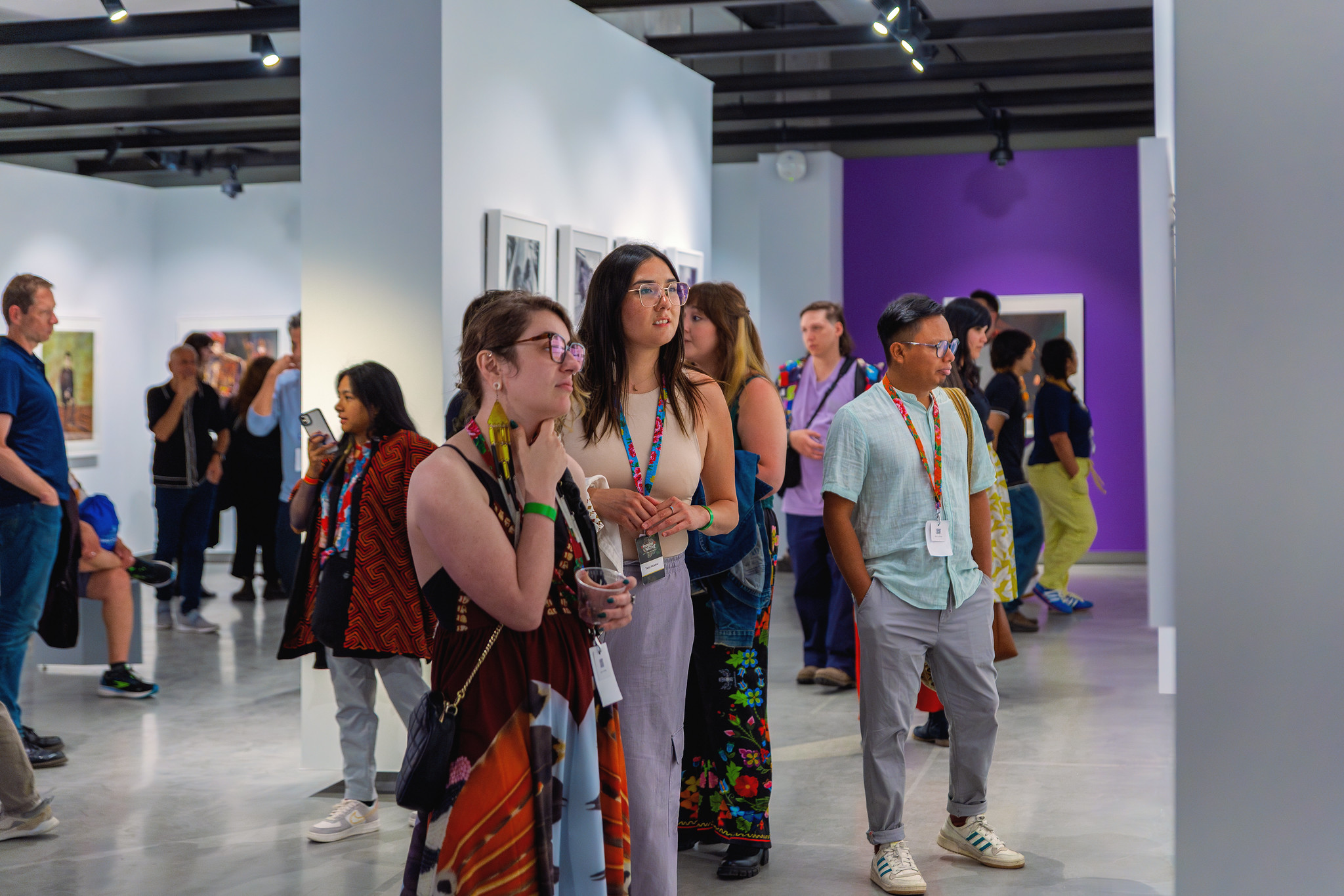 Visitors tour Belonging exhibition