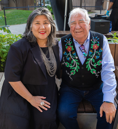 Photo of OCAD U President Ana Serrano and Métis Elder Dr. Tony Belcourt at the park celebration