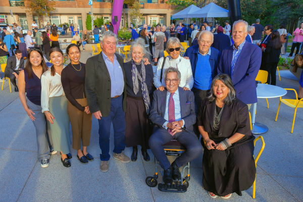 Group photo of guests attending Butterfield Park celebration outside on a sunny day.