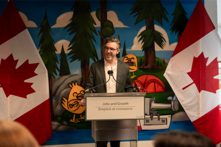 Matthew Thomas speaking at Destination Northern Ontario’s tourism summit. 