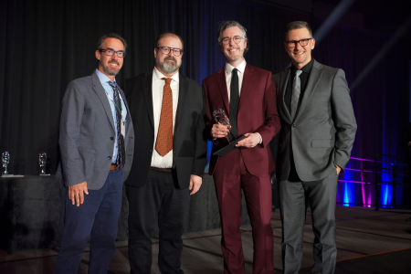 Matthew and Whereabouts Co-Founder Mike Jacobs receiving the "Innovator of the Year" award at the 2024 Tourism Industry Association of Ontario Tourism Summit. 