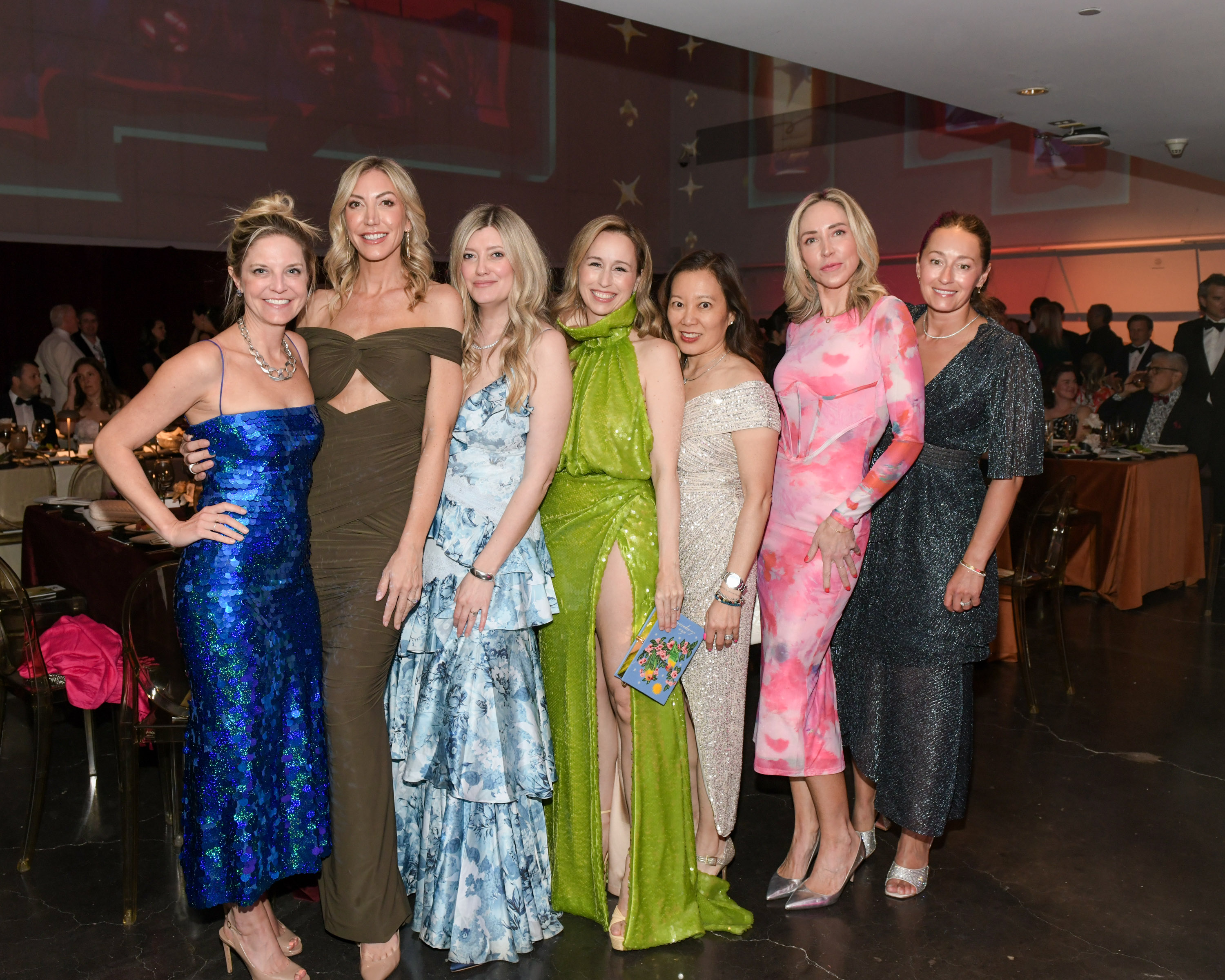 Group of people posing for a photo at the Gala
