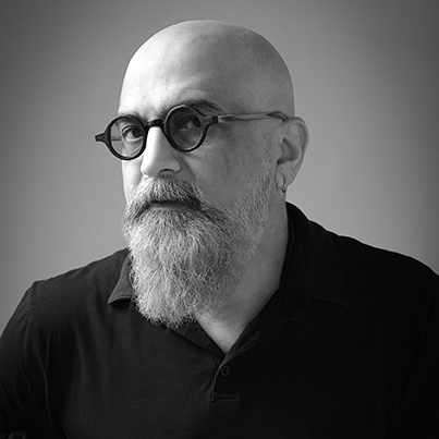 Photo of man with glasses and beard and mustache, Faisal Anwar