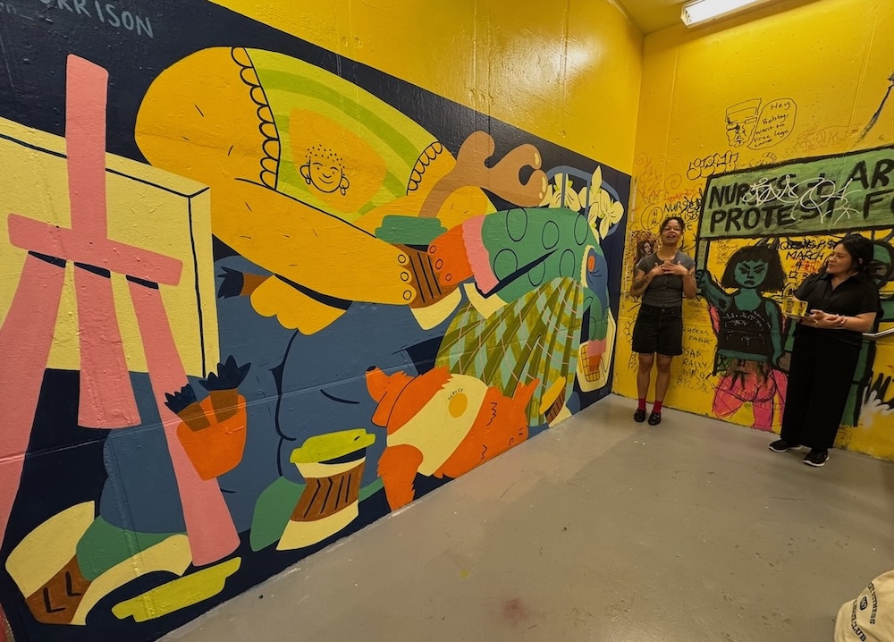 Mural in yellow staircase