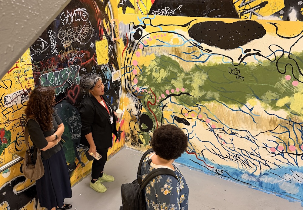Mural on yellow staircase