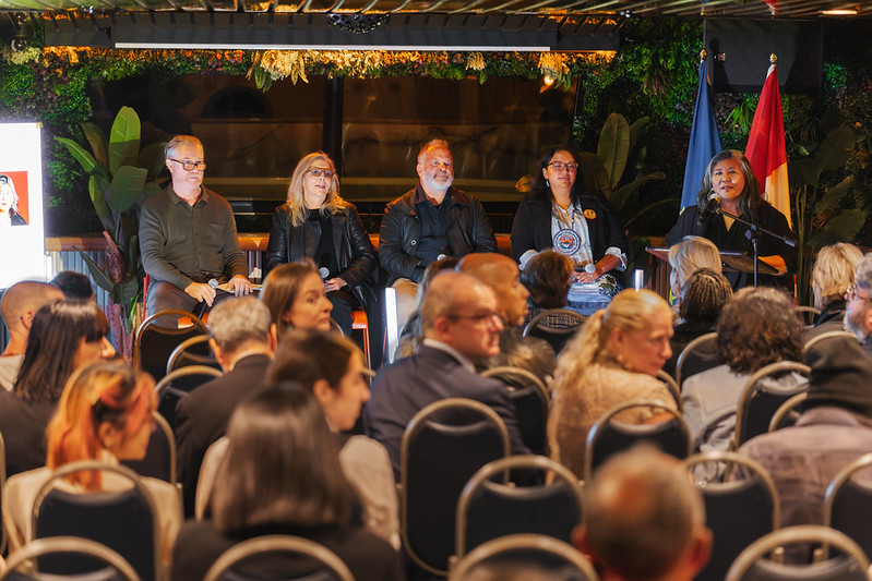 Panel discussion (left to right): Paul Murnaghan, Dr. Claire Brunet, Johnny Ranger, Dr. Kelsey Leonard and President Ana Serrano, sitting in front of audience.