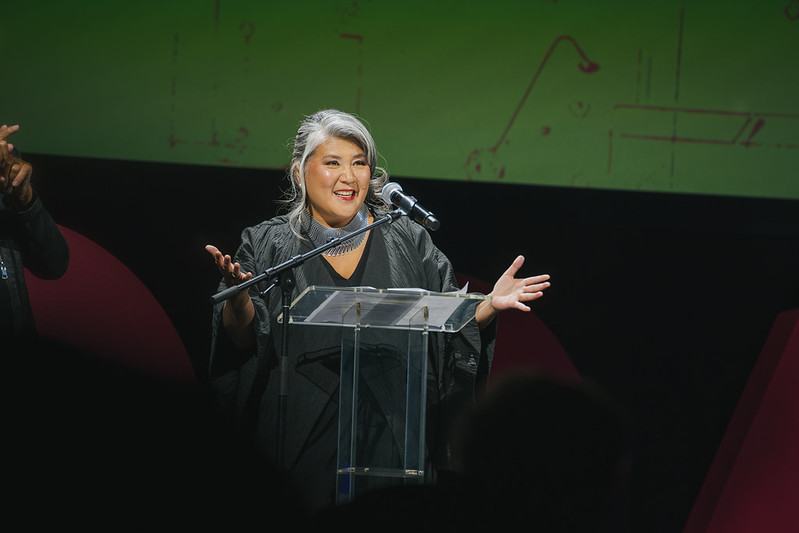 President Ana Serrano at the podium