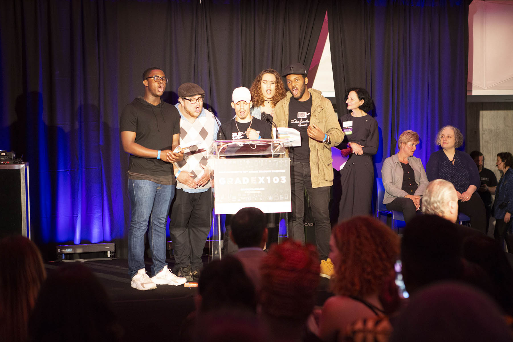 Hamilton Youth Poets, photo by Martin Iskander Six people reciting dub poetry on stage