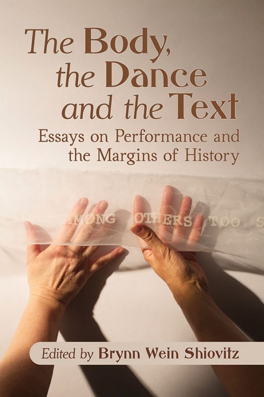 photo of hands under transparent fabric with book title above