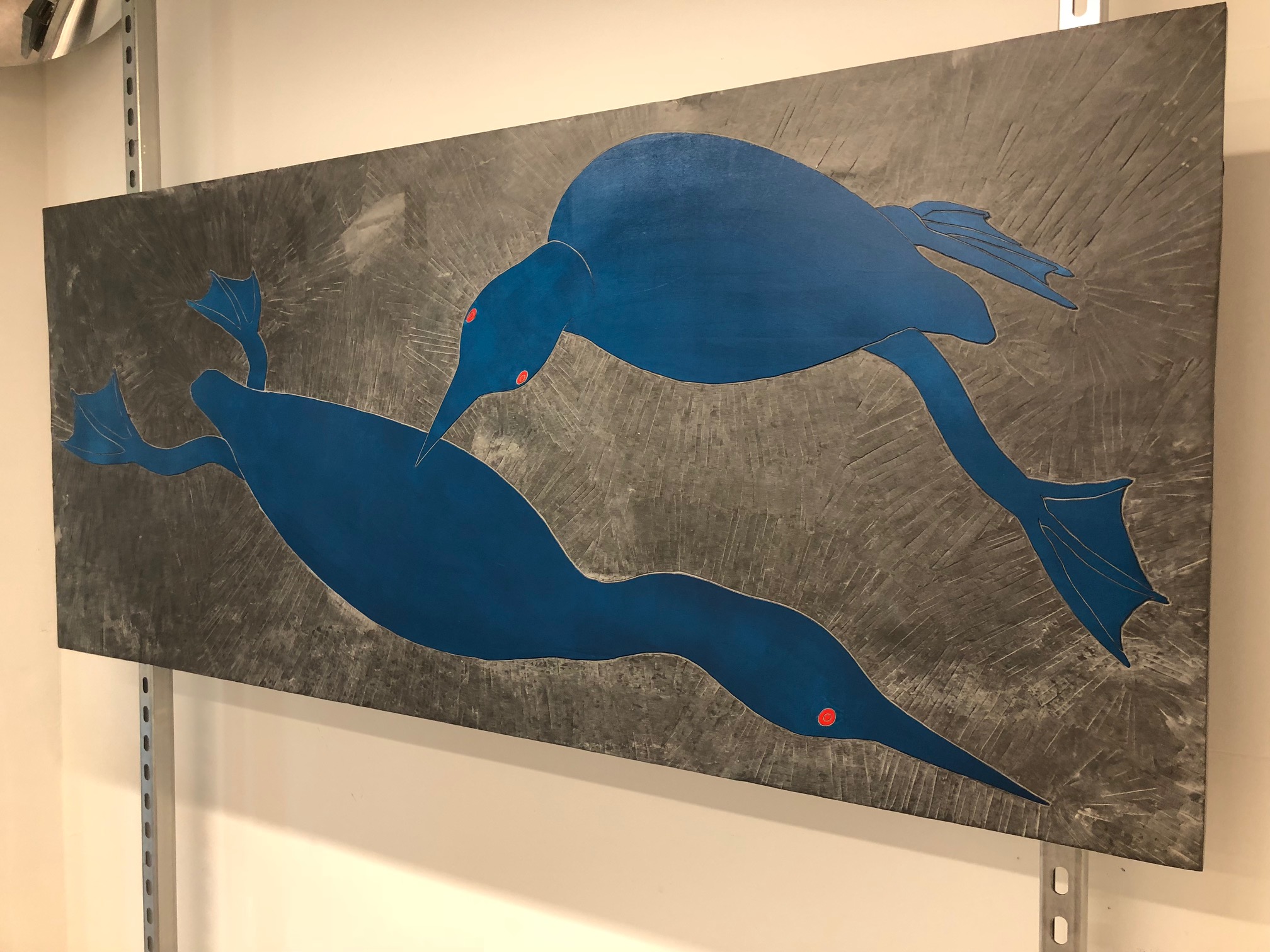 Large slate slab carved with two blue birds