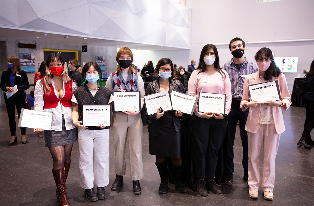 Students who received Student Leadership Awards holding their certificates