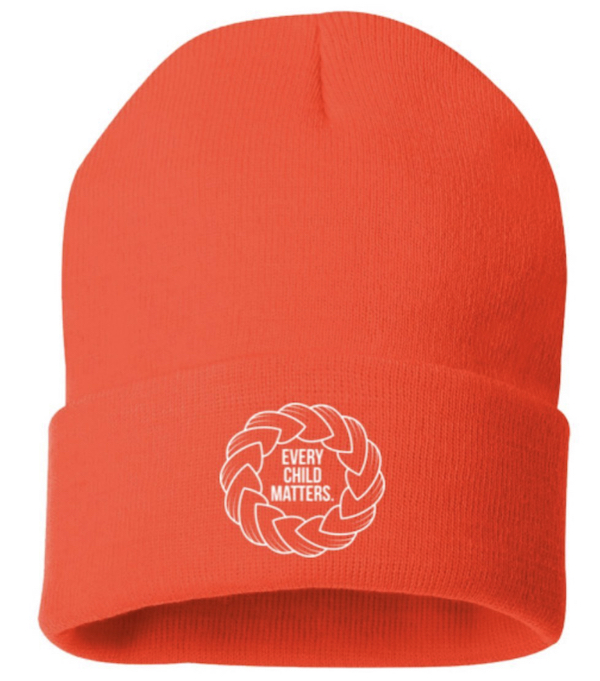 A winter hat with the phrase Every Child Matters embroidered in the centre.