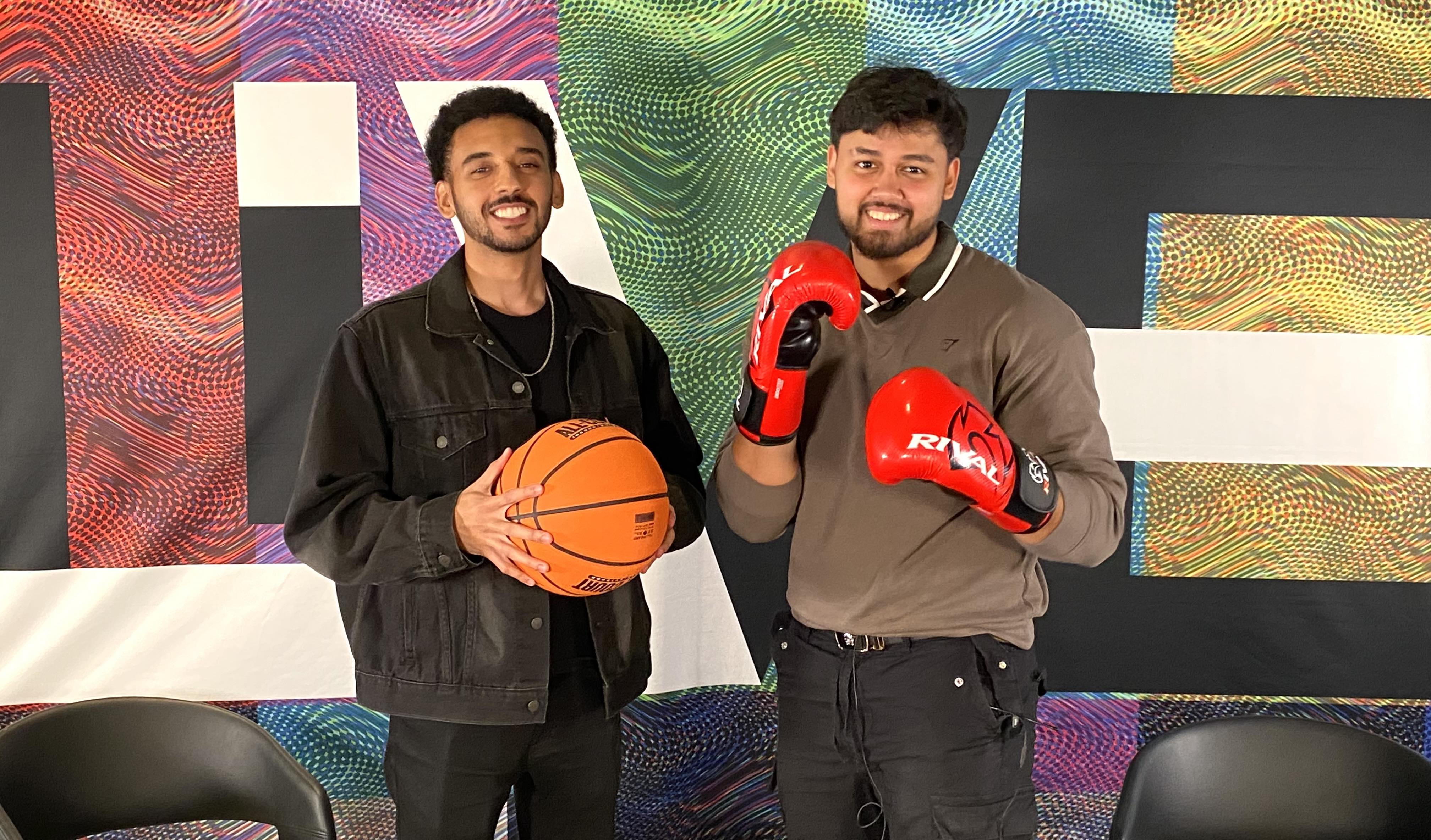 Two people one in front of a background with LIVE written on it one holding a basketball the other holding Yellowgloves