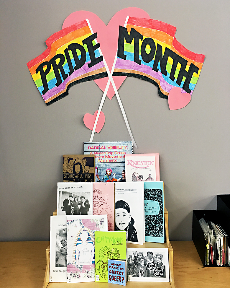 Photograph of Pride Month zine display and text