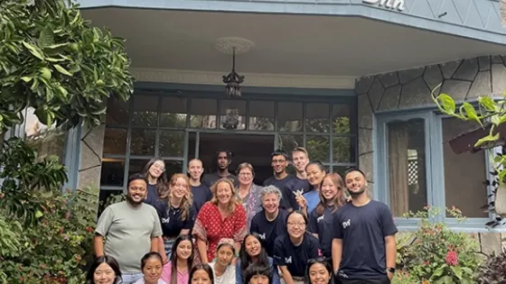 Cover image displaying a group photo of all students