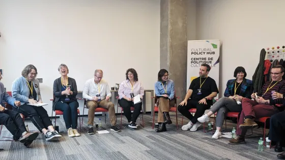 People sitting in a circle talking