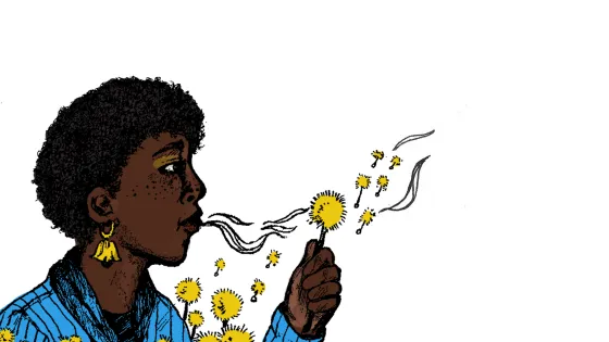A person blowing dandelions