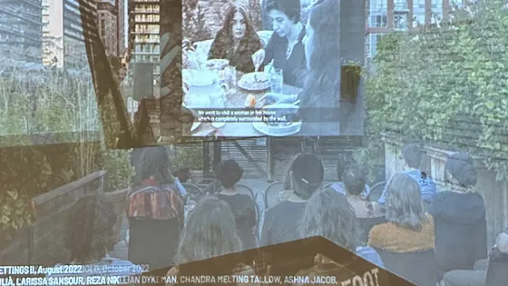 view of projected slideshow at Critical Distance