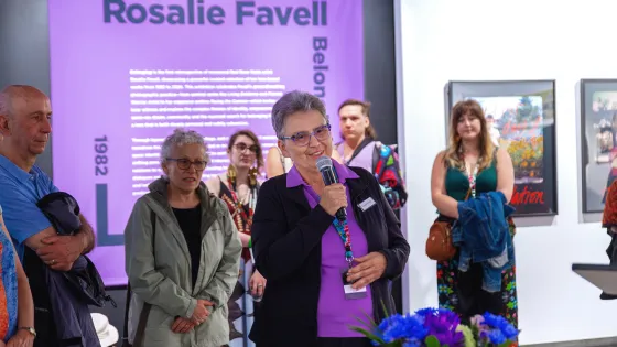 Rosalie Favell speaking at the opening of new retrospective exhibition