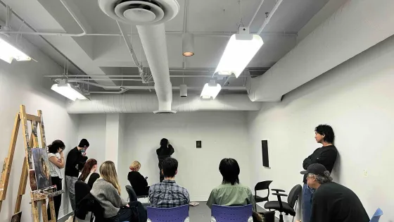 Student participating Critique Club
