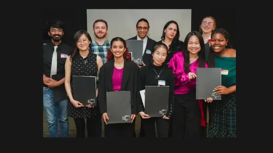 Students holding their awards
