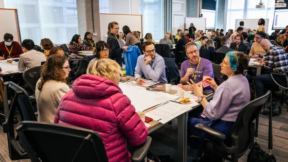 Photo of people sitting at a table