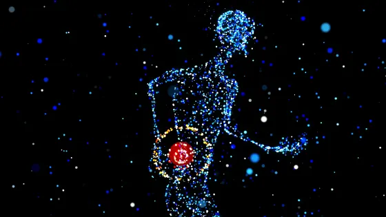 An illustration of a body, blue speckled dots, with a red circle at the back of the person to illustrate back pain