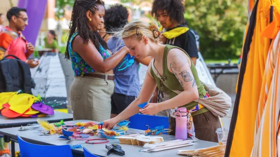 Person working at a table at orientation