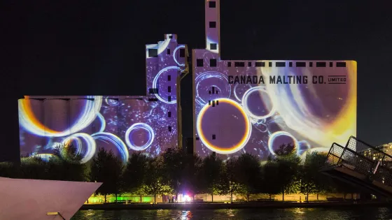 Projection of artwork on Canada Malting Silos, background purpose with circles
