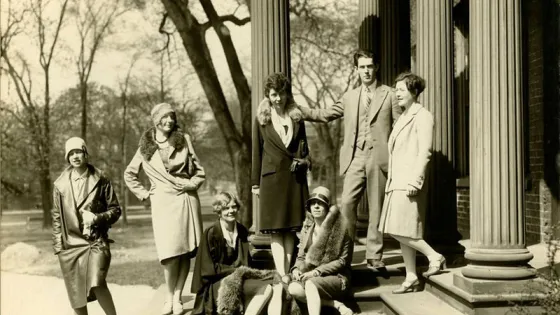 Women and men in 1920s clothing outside George Reid House