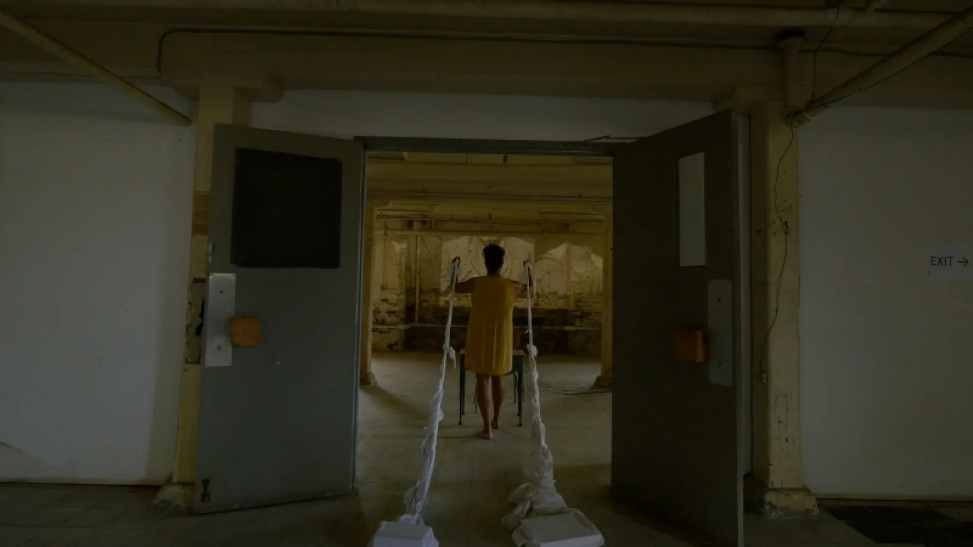 A person standing in a doorway