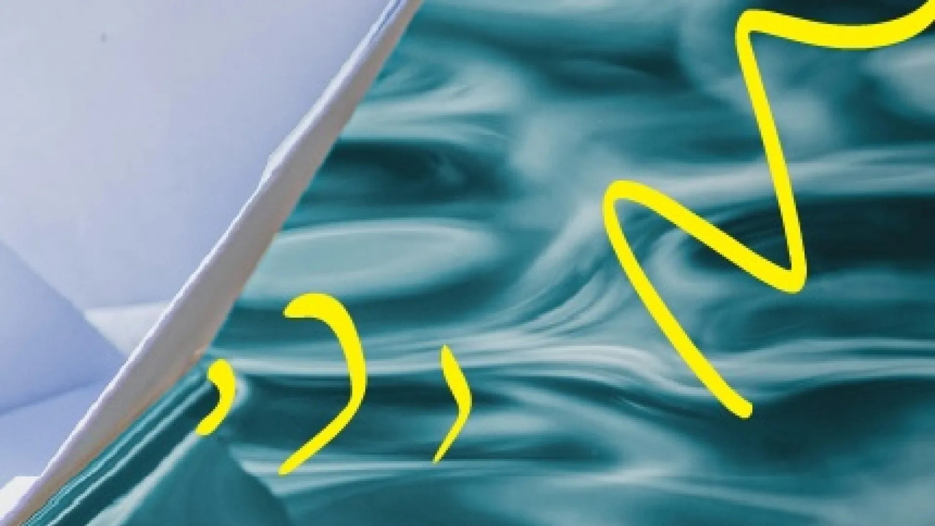 paper boat closeup on water with yellow accents