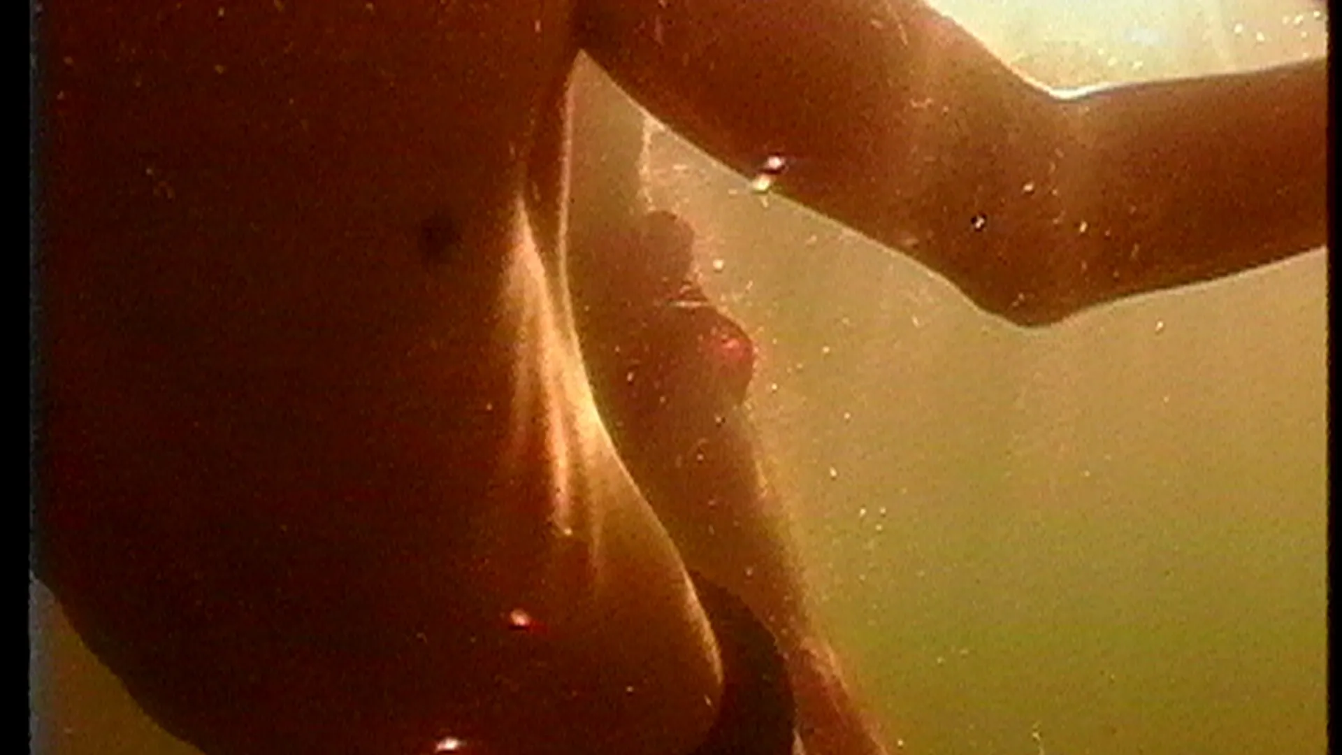 Underwater shot of a boy swimming
