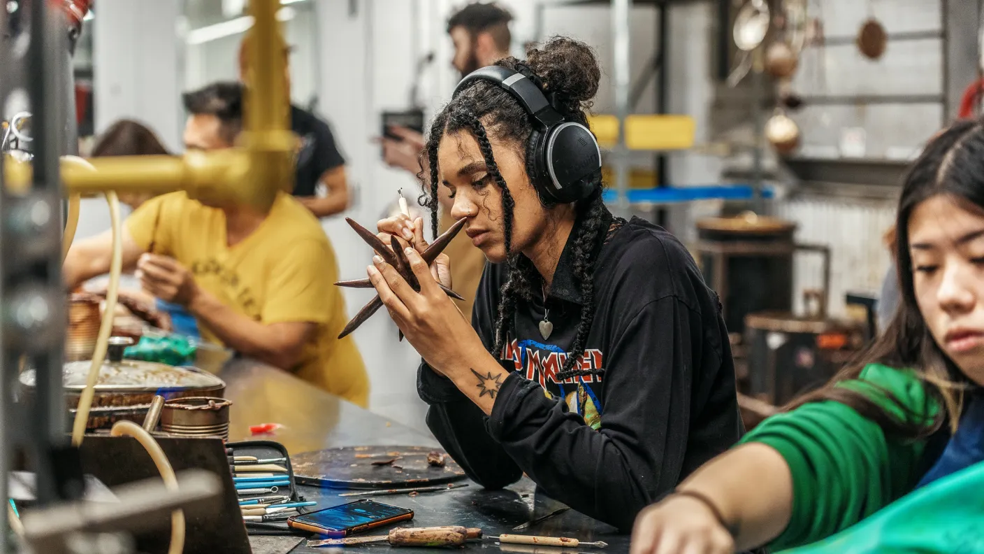 Student working on a sculpture