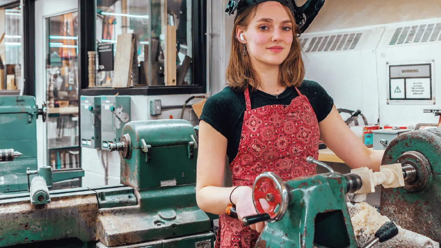 Student working on a lathe