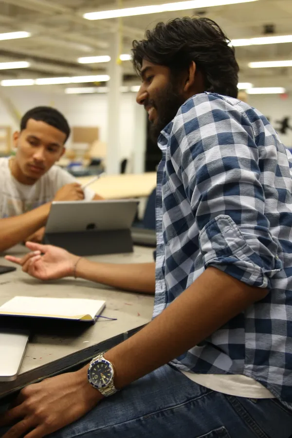 Group of students at a table working together