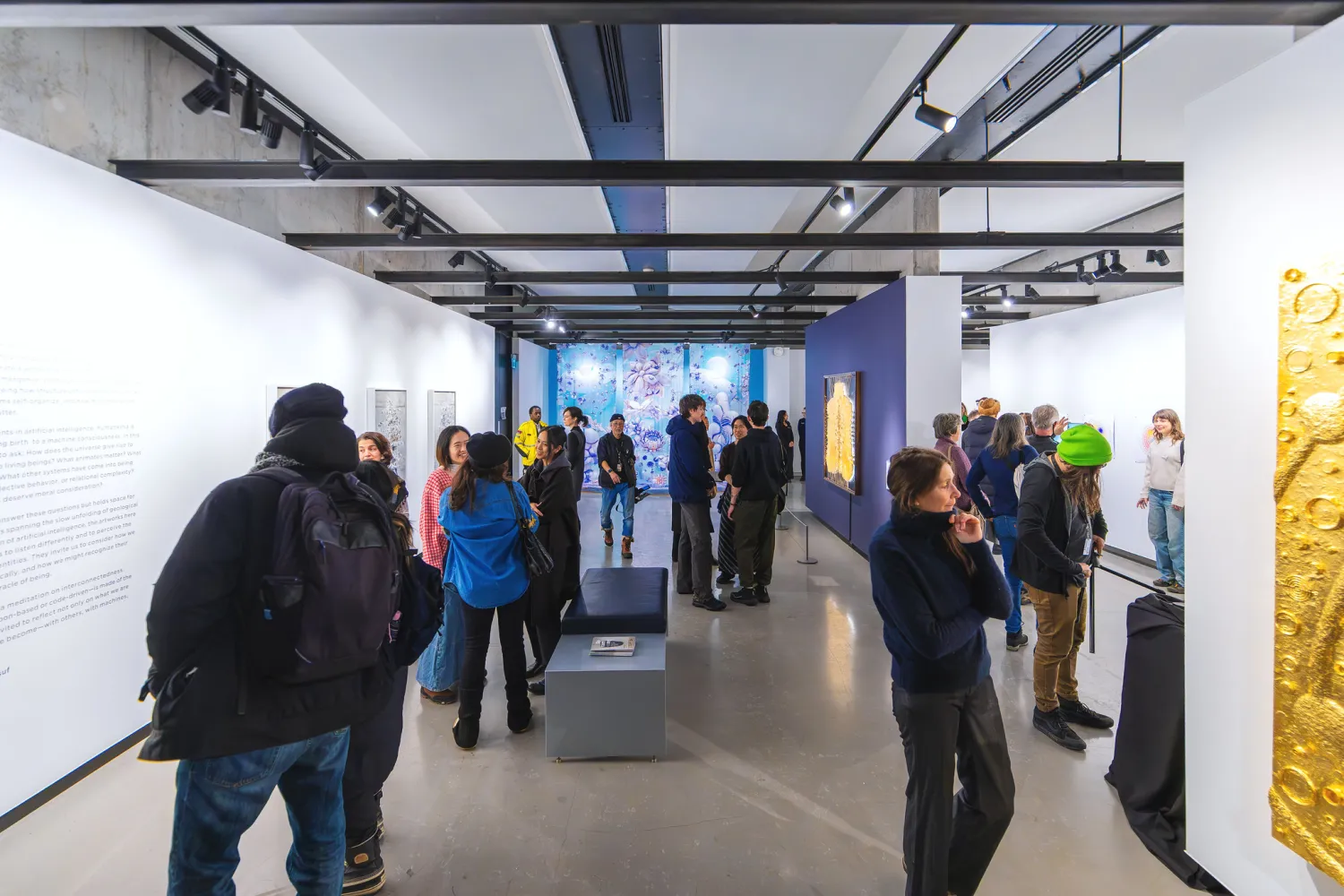 Visitors admire artworks at Onsite Gallery