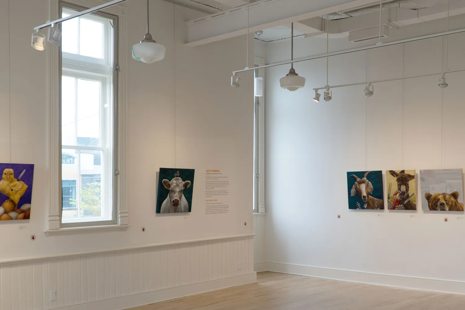 Paintings on display at Aurora Cultural Centre Homeroom Galleries