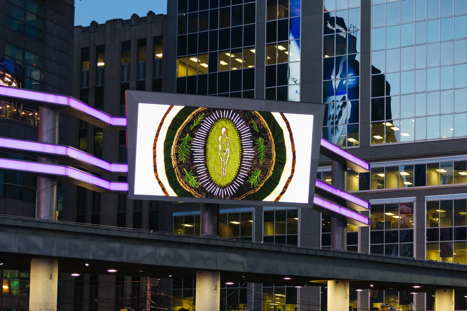 Digital screen at Sankofa Square displaying artwork by Jordyn Hendricks.