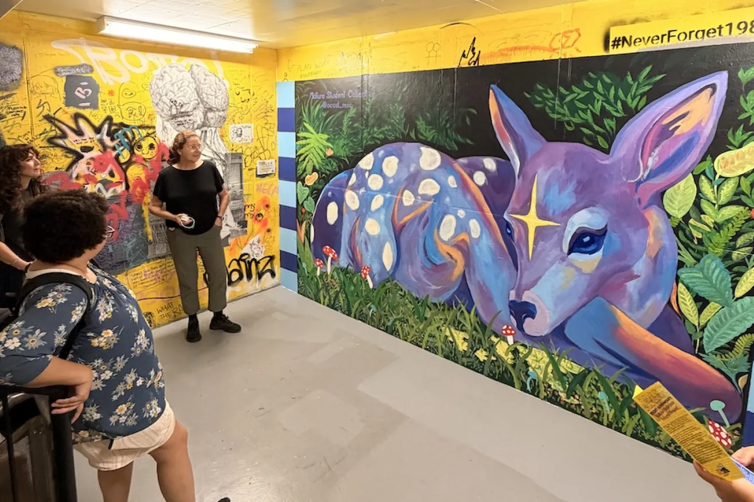 Mural of a fawn in yellow staircase