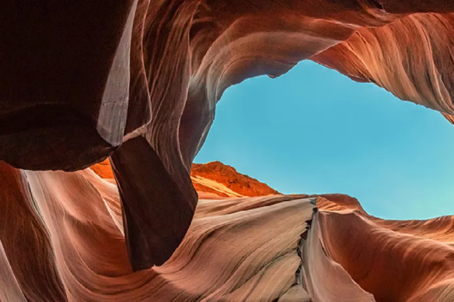 View of sky looking up through a canyon