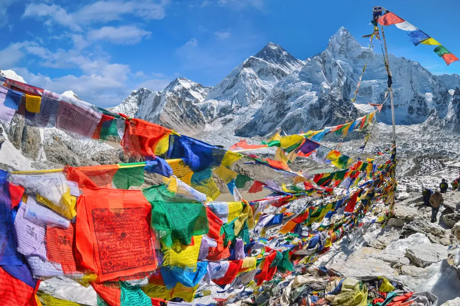 Mt. Everest and surrounding area with lots of colourful flags