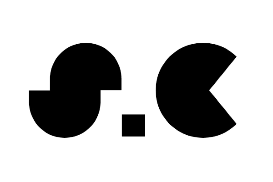 Stylized letters "S" dot "C"