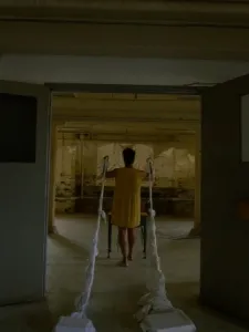 A person standing in a doorway