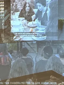 view of projected slideshow at Critical Distance