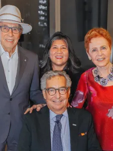 Isadore Sharp, President Ana Serrano, Rosalie Sharp and Chancellor Jaime Watt posing for a group photo.