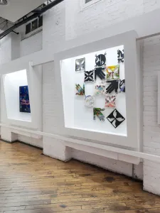 Gallery 44 vitrines displaying artwork by Philip Leonard Ocampo