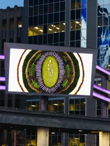 Digital screen at Sankofa Square displaying artwork by Jordyn Hendricks.