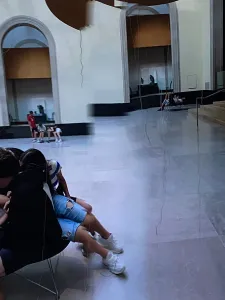 Post of museum with people